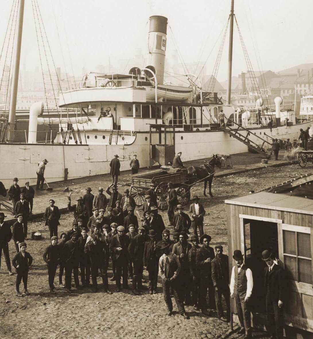 historical photo of rukert employees collecting payment for work